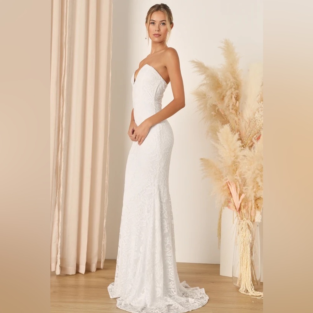 Strapless Maxi Wedding Dress . Size XL. Color is White. NEVER WORN